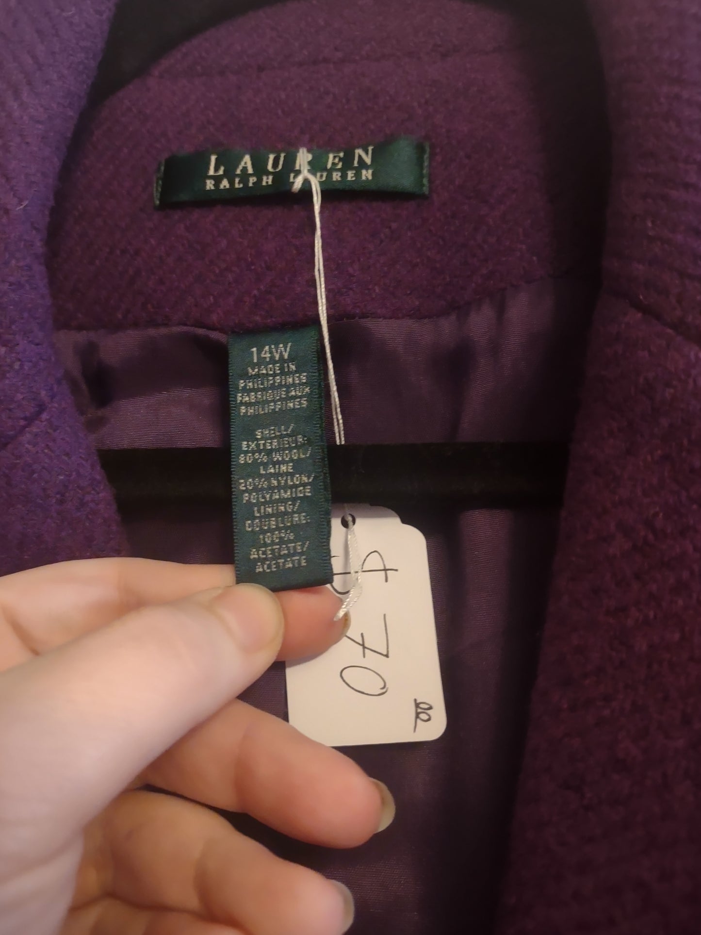 Purple garment with a tag showing 'Lauren Ralph Lauren' and a price of $70.