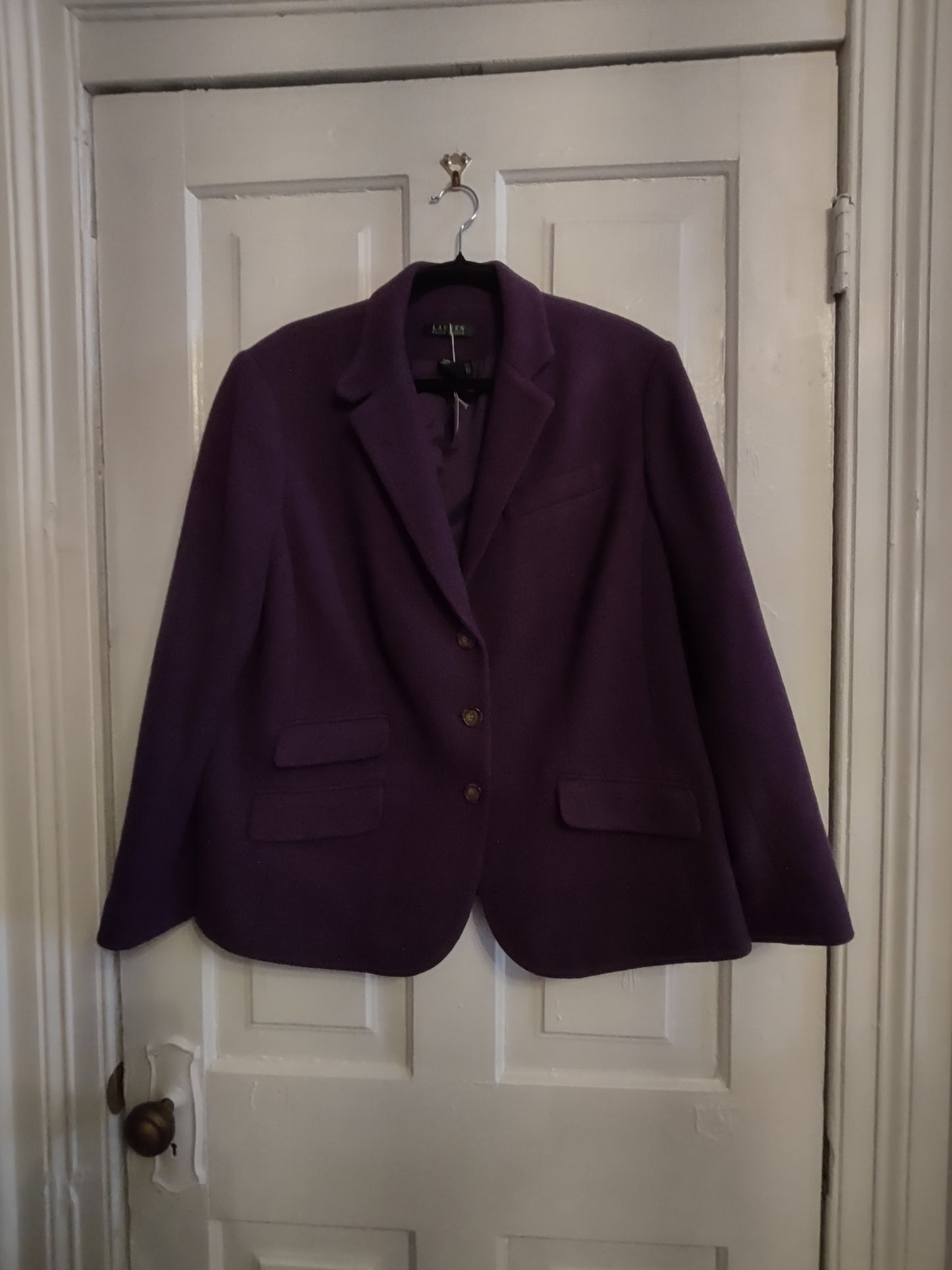 Purple Blazer on a white door